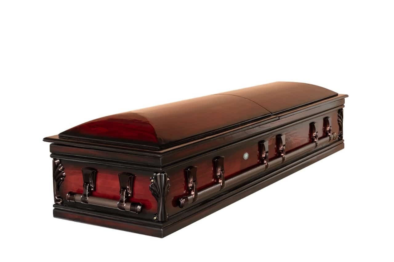 Dome-lid deep red casket with dark fittings